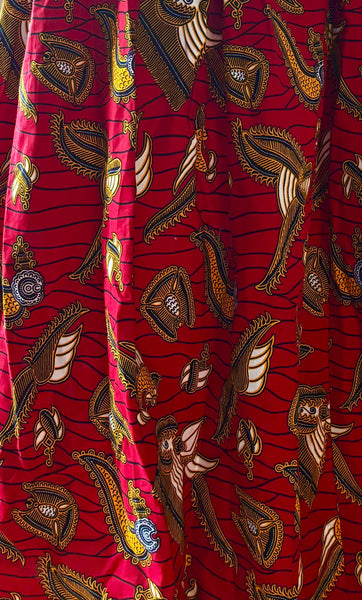 African print maxi skirt in red with botanical motifs.