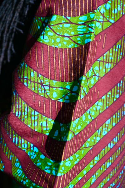 Button down Boubu in a deep brown with dashes of green.