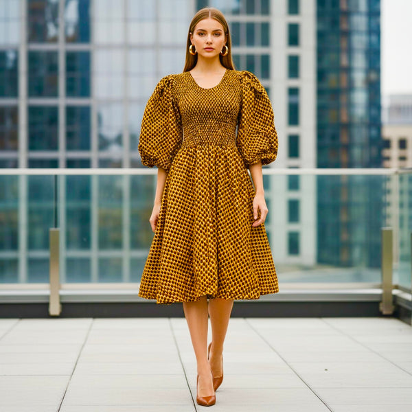 NAANI balloon sleeve dress in brown.