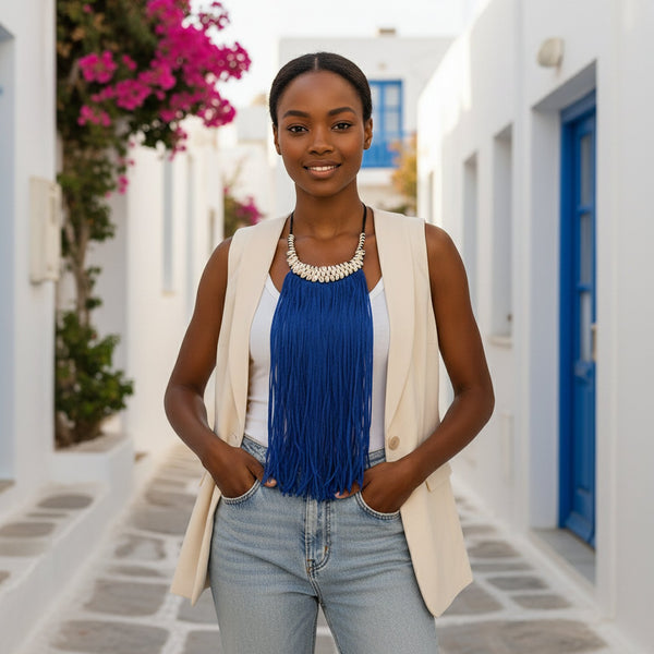 Blue statement long fringe necklace embellished with cowries.