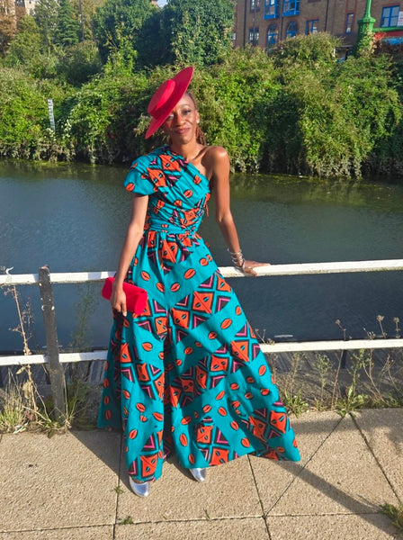 Fula free size palazzo infinity jumpsuit in green and red Aztec print.