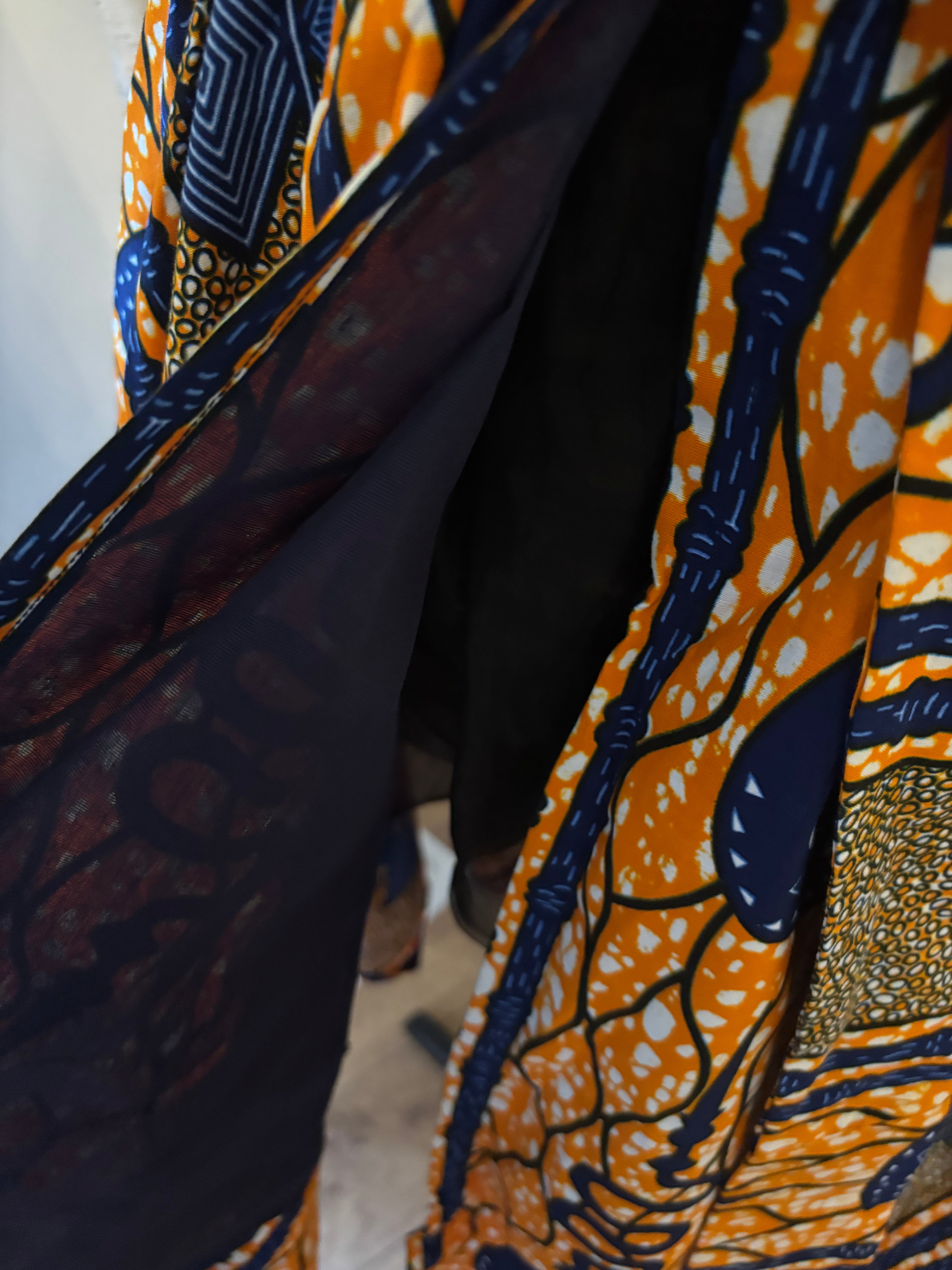 Kayla 50’s shirt style dress in a bold contemporary geometric African print.