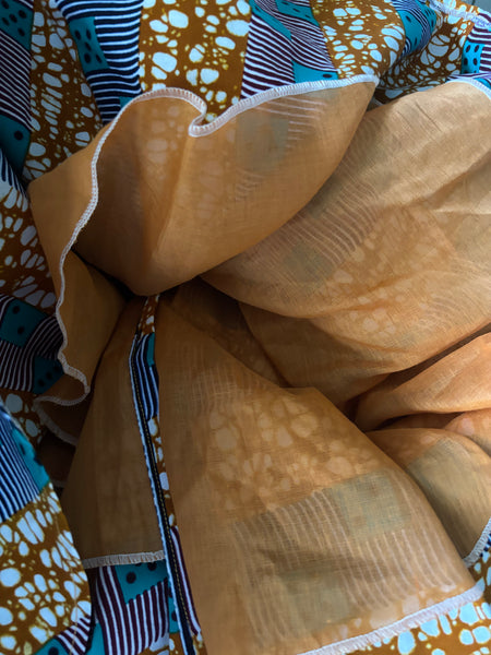 Kayla 50’s shirt style dress in a contemporary geometric African print.