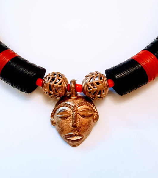 African beaded necklace with bronze African mask pendant