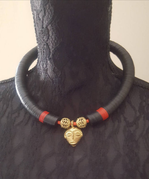 African beaded necklace with bronze African mask pendant